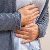 Ein mögliches Anzeichen für einen Mangel an Vitamin B6: Betroffene plagen sich mit Durchfall oder Erbrechen.